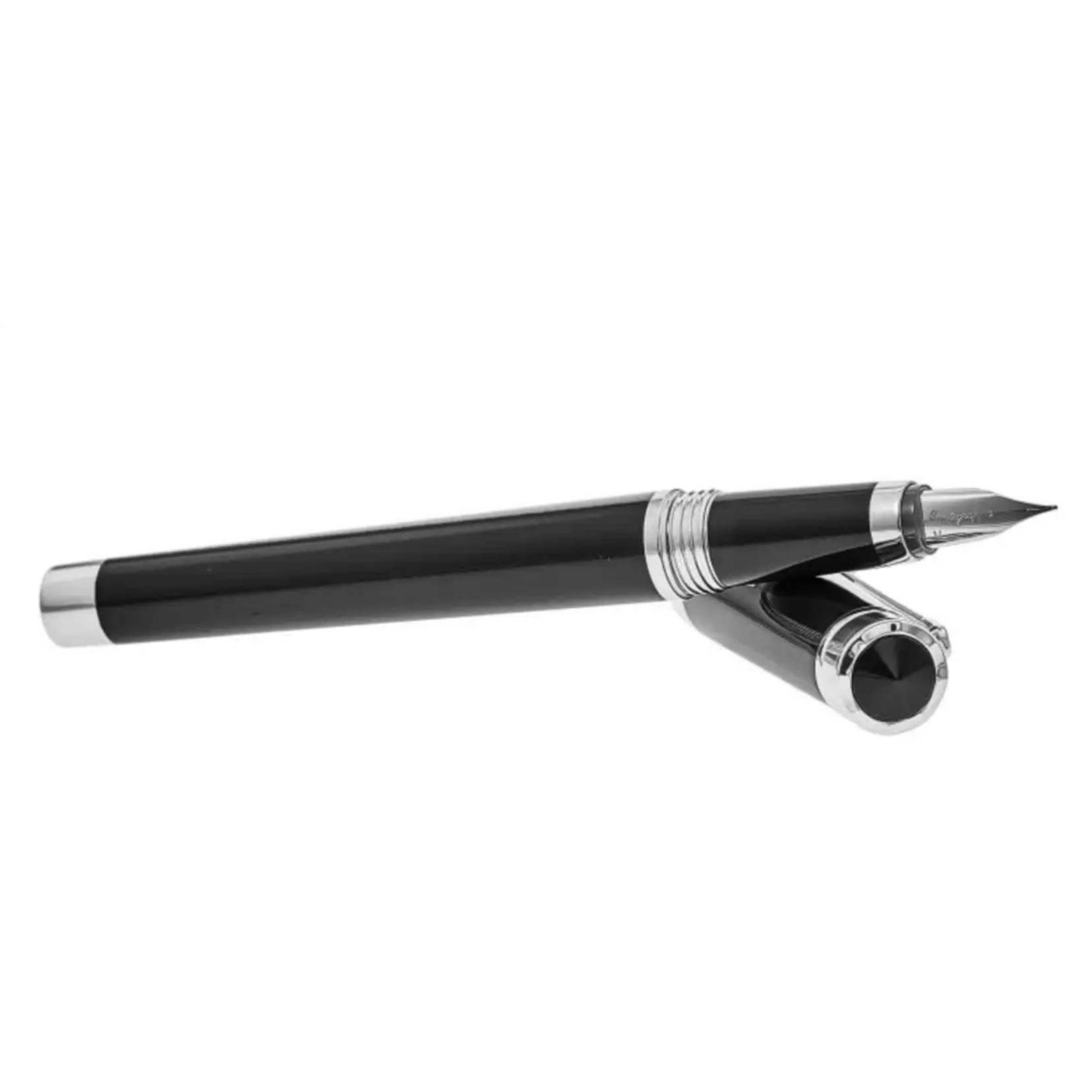 A black fountain pen with silver accents, featuring a sleek design and pointed nib.