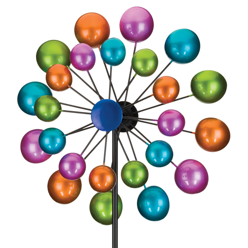 The colorful double wind spinner features vibrant spheres in blue, green, orange, and purple on a black frame, radiating from a central point.