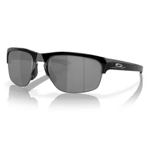 Semi-rimless sunglasses with black frames and dark lenses, featuring a small logo on the side.