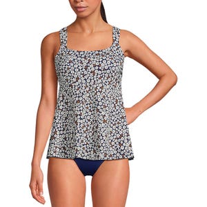 Flutter scoop-neck tankini top in a navy floral print with white and brown flowers, featuring wide shoulder straps and a flared, flowy design.