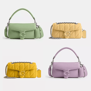 Four handbags in two styles: top row shows a green and a yellow chain-strap bag; bottom row includes a yellow quilt-pattern chain-strap bag and a lilac handbag, all with a circular clasp.