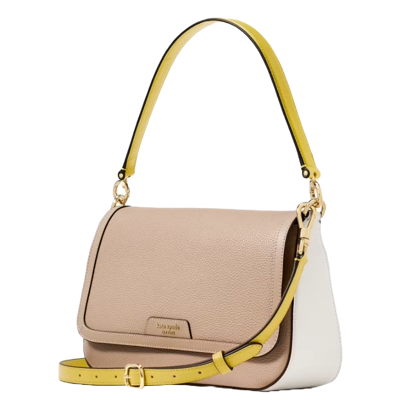 A stylish handbag with a beige pebbled leather body, white side panel, and yellow adjustable strap, featuring gold-tone hardware and a flap closure with a brand name tag.