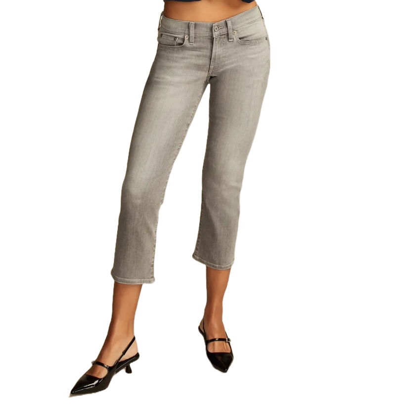 Gray cropped jeans paired with black pointed-toe slingback heels.