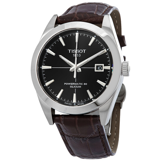 Tissot Gentleman Automatic Watch features a sleek stainless steel case, black dial with silver hour markers, date display, and a brown leather strap. It's labeled with \“Powermatic 80 Silicium\“ for enhanced precision and durability.