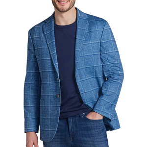 Blue plaid blazer paired with a dark blue t-shirt and jeans.