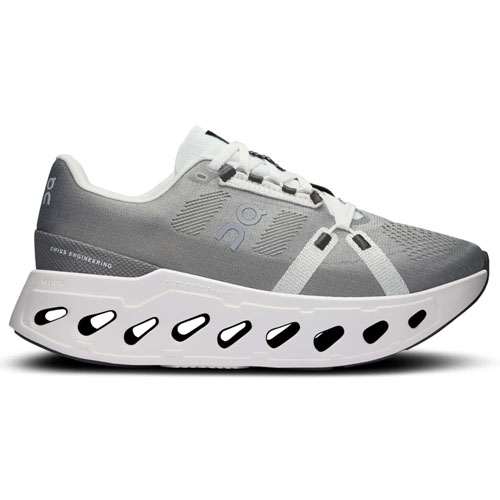 A pair of gray athletic sneakers with a unique design featuring a thick, white sole and geometric cutouts, showcasing a brand logo on the side.