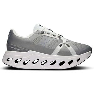 A pair of gray athletic sneakers with a unique design featuring a thick, white sole and geometric cutouts, showcasing a brand logo on the side.