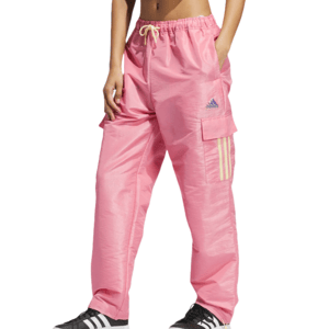 Pink Adidas woven pants with an elastic waistband and drawstring, featuring side pockets and a cargo pocket with three stripes and the Adidas logo. Paired with black and white Adidas sneakers.