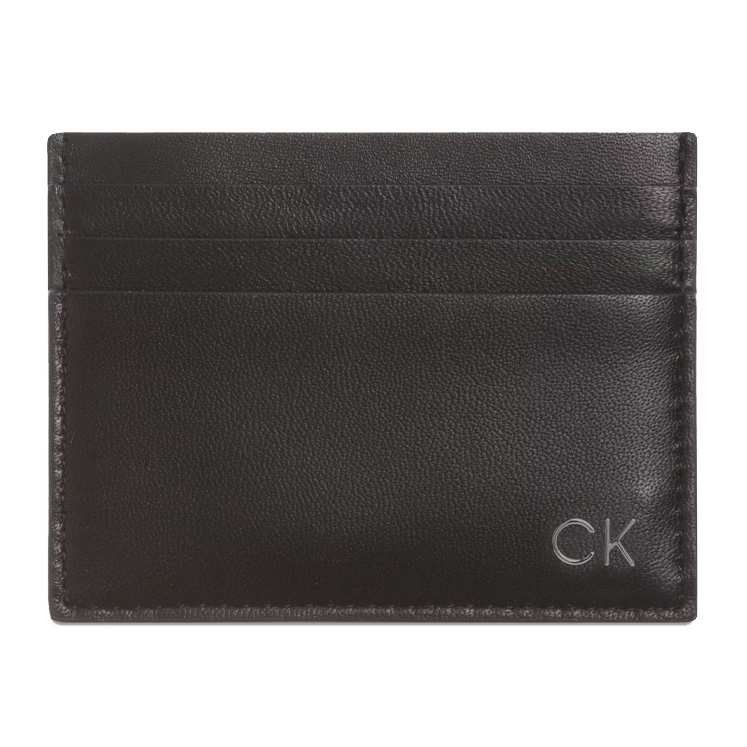 A sleek black leather cardholder featuring a minimalist design with three card slots and the \“CK\“ logo embossed in the lower right corner.