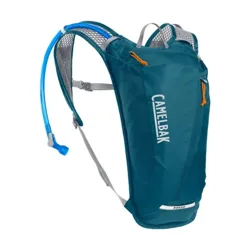 A blue CamelBak Rogue hydration backpack with an attached drinking tube and adjustable straps, designed for outdoor activities.