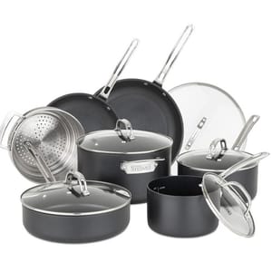 A set of non-stick cookware featuring various pots and pans with glass lids and stainless steel handles, including a steamer insert.