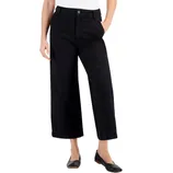 A person is wearing black wide-leg ankle-length trousers with a white top and black flat shoes.