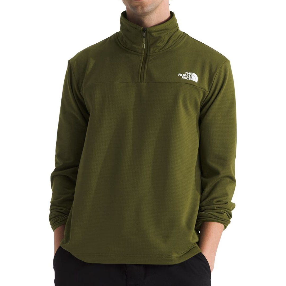 The North Face Cedar Trail Pullover is an olive green, long-sleeve top with a quarter-zip neckline, featuring the brand's logo on the left chest.