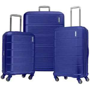 Three blue hard-shell suitcases of varying sizes, each with four swivel wheels and telescopic handles, suitable for easy maneuverability.