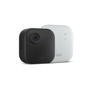 Blink Camera + Sync Module XR includes a compact black security camera with a wide lens and a white sync module for wireless connectivity. Both are branded with \“blink\“ and designed for home surveillance.