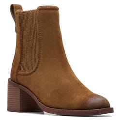 A brown suede Chelsea boot with a block heel and elastic side panels.