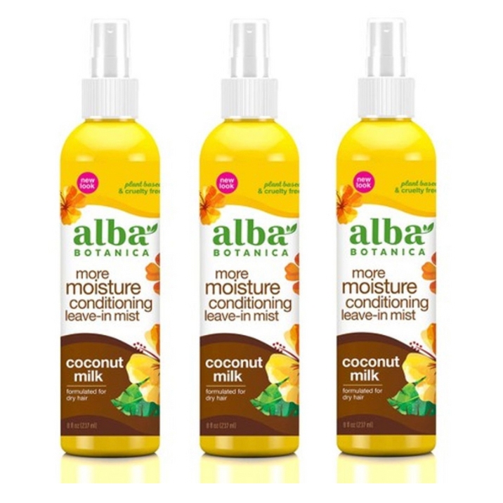 Alba Botanica More Moisture Conditioning Leave-In Mist with coconut milk, formulated for dry hair, in 8 fl oz bottles. Plant-based and cruelty-free, featuring a new look.
