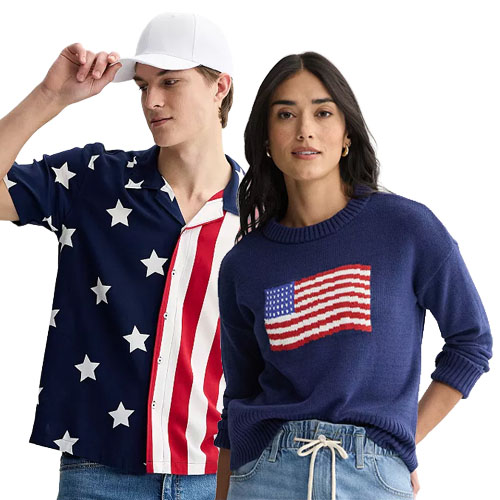 A man in a star-spangled shirt with red and white stripes and a woman in a navy sweater featuring a U.S. flag design, both wearing casual denim bottoms.