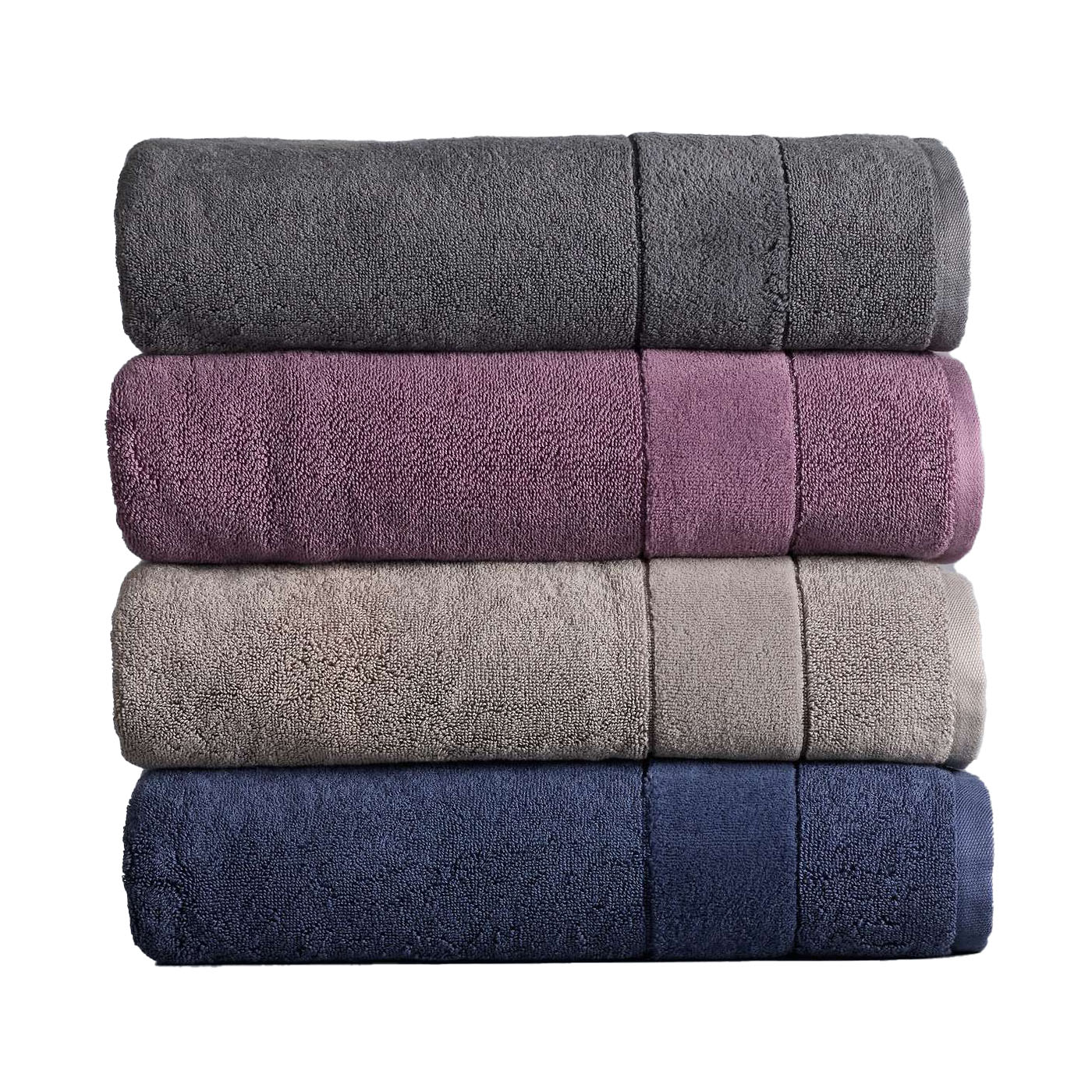 Stack of four rolled Vera Wang Turkish bath towels in gray, purple, beige, and navy, showcasing plush, absorbent fabric.
