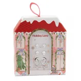 Set of cubic zirconia sterling silver earrings in a holiday-themed box with a red roof and festive decorations.