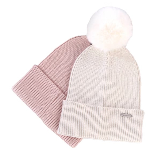 The 2pc Steve Madden Beanie Set includes a light pink ribbed beanie and a cream ribbed beanie with a white pom-pom on top. Both beanies have a cuffed design for added style and warmth.