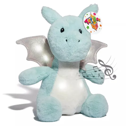 A plush light blue dragon with metallic silver wings and a white belly, featuring a tag that reads \“Toy Box.\“ Musical notes are illustrated near the dragon, suggesting it may play music.