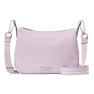A light purple Kate Spade New York crossbody bag with a zip closure and an adjustable striped shoulder strap featuring metal clasps.