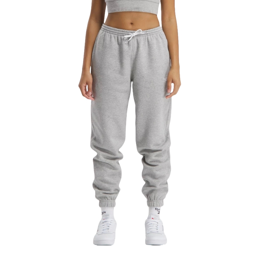 Gray sweatpants with an elastic waistband and cuffs, paired with white sneakers and Reebok socks.