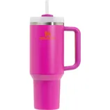 Bright pink insulated travel mug with lid, straw, and handle, branded \“Stanley.\“