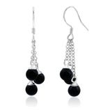 Dangle earrings featuring silver chains with three black beads on each, suspended from hook fastenings.