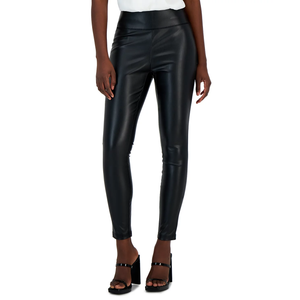 Black faux leather leggings paired with black high-heeled sandals.