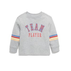 Gray long-sleeve sweatshirt with \“TEAM PLAYER\“ printed on the front in red and blue, featuring multicolored stripes on the sleeves.