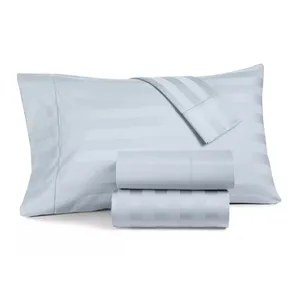 Light blue striped bed sheet set, including two folded sheets and a pillowcase.