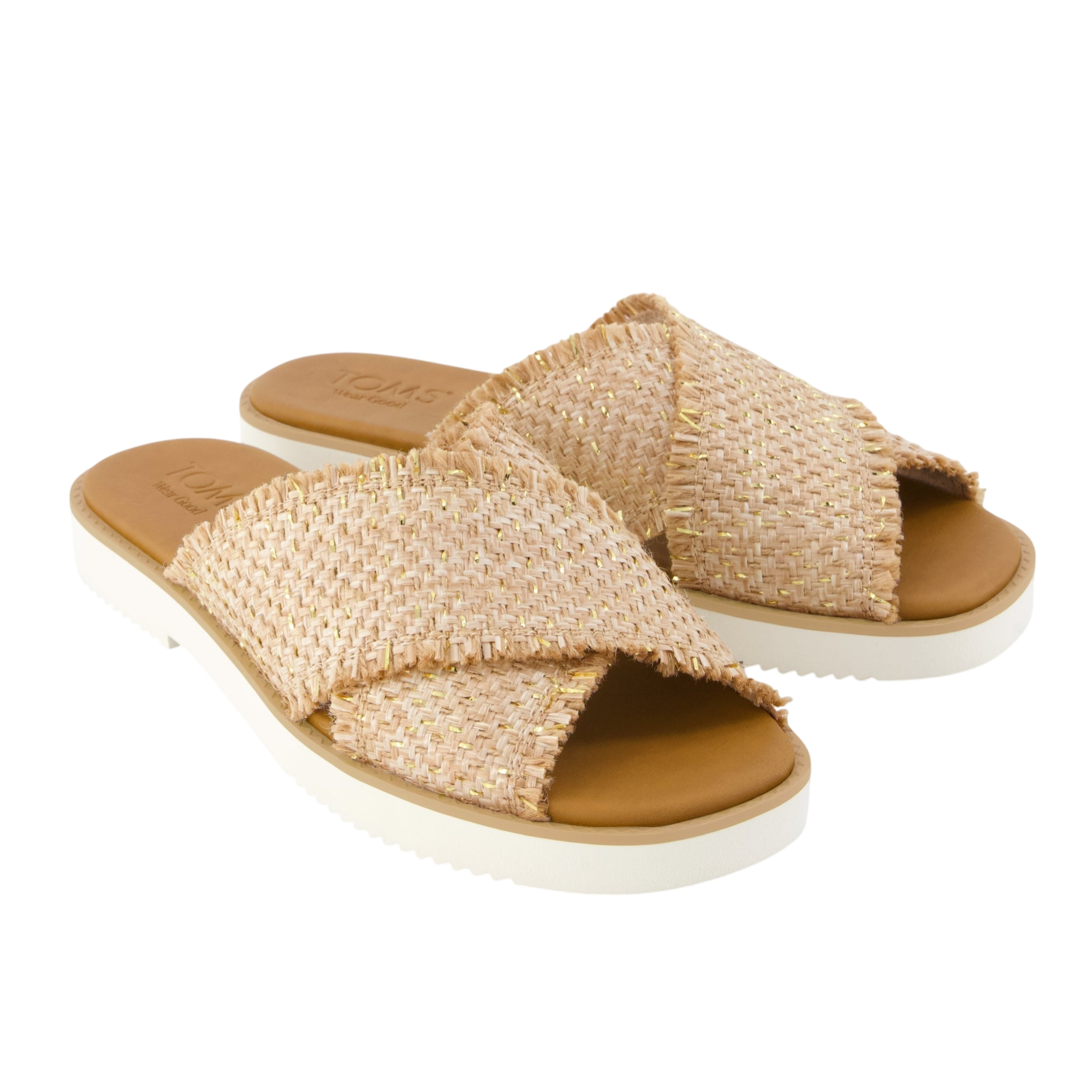 Woven cross-strap sandals with a tan footbed and white sole, featuring fringe detailing on the straps.