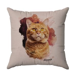 A decorative pillow featuring a portrait of an orange tabby cat against a colorful abstract background, with the name \“Dennis\“ written at the bottom.
