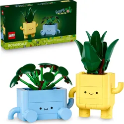 LEGO Botanicals set featuring two playful plant figures with cute faces, one in a yellow pot with tall leaves and another in a blue pot with circular leaves. Set number 10349 contains 217 pieces.