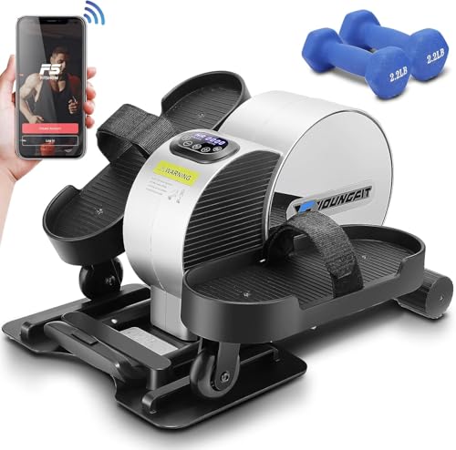 An under-desk elliptical machine with adjustable straps and an electronic display, accompanied by a pair of blue 2.2 lb dumbbells.