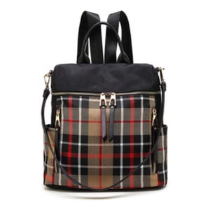 A stylish backpack with a plaid pattern in beige, red, and black, featuring multiple zippers, a top handle, and adjustable shoulder straps.