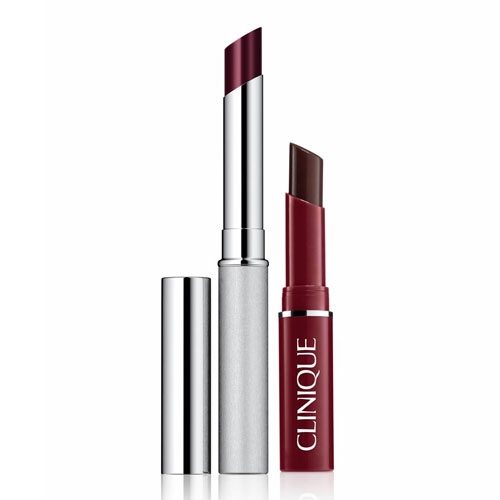 Two tubes of Clinique lipstick, one with a silver case and exposed dark berry color, and the other capped in a matching color.