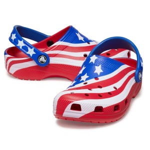 Red, white, and blue Crocs with stars and stripes resembling a patriotic theme.