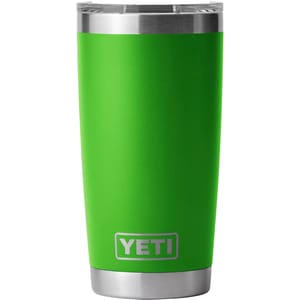 A green Yeti 20oz Rambler with a stainless steel bottom and clear lid. The brand logo is visible at the base.