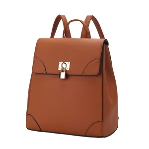 Brown leather backpack with a flap top secured by a gold-tone lock and featuring adjustable straps.