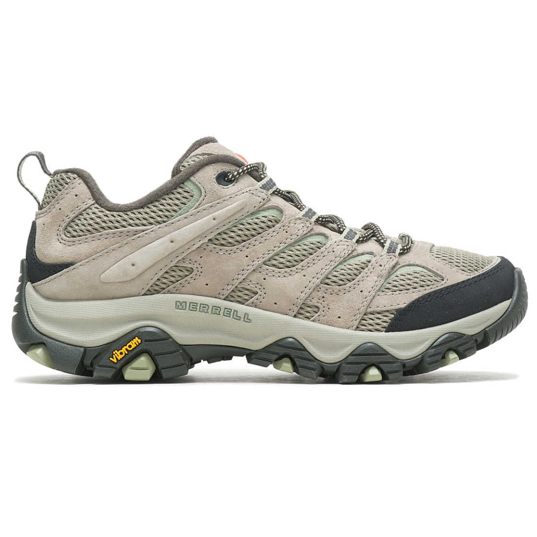 Merrell hiking shoe in beige with black and grey accents, featuring a Vibram sole for traction.