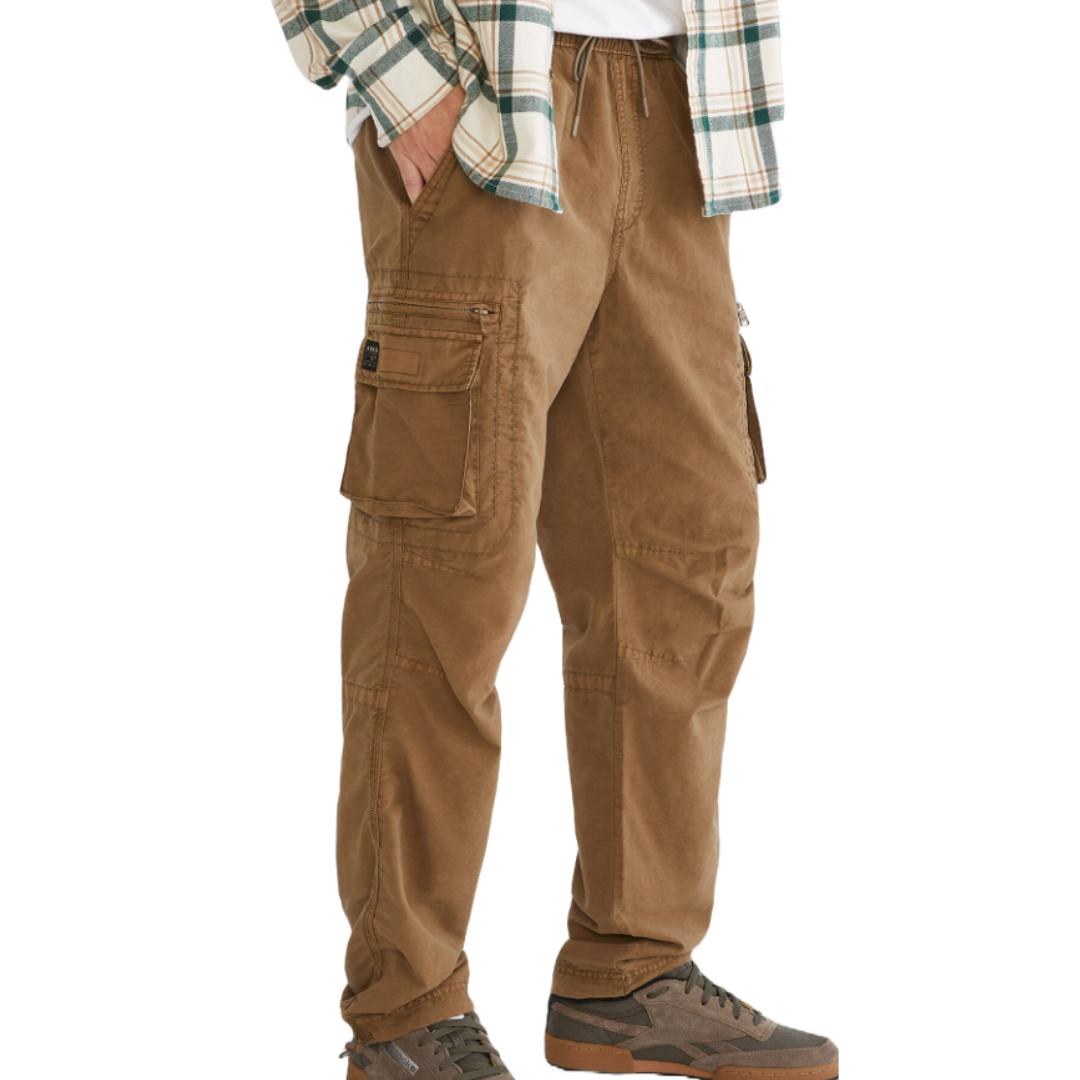Brown cargo pants with multiple pockets, paired with a plaid shirt and sneakers.