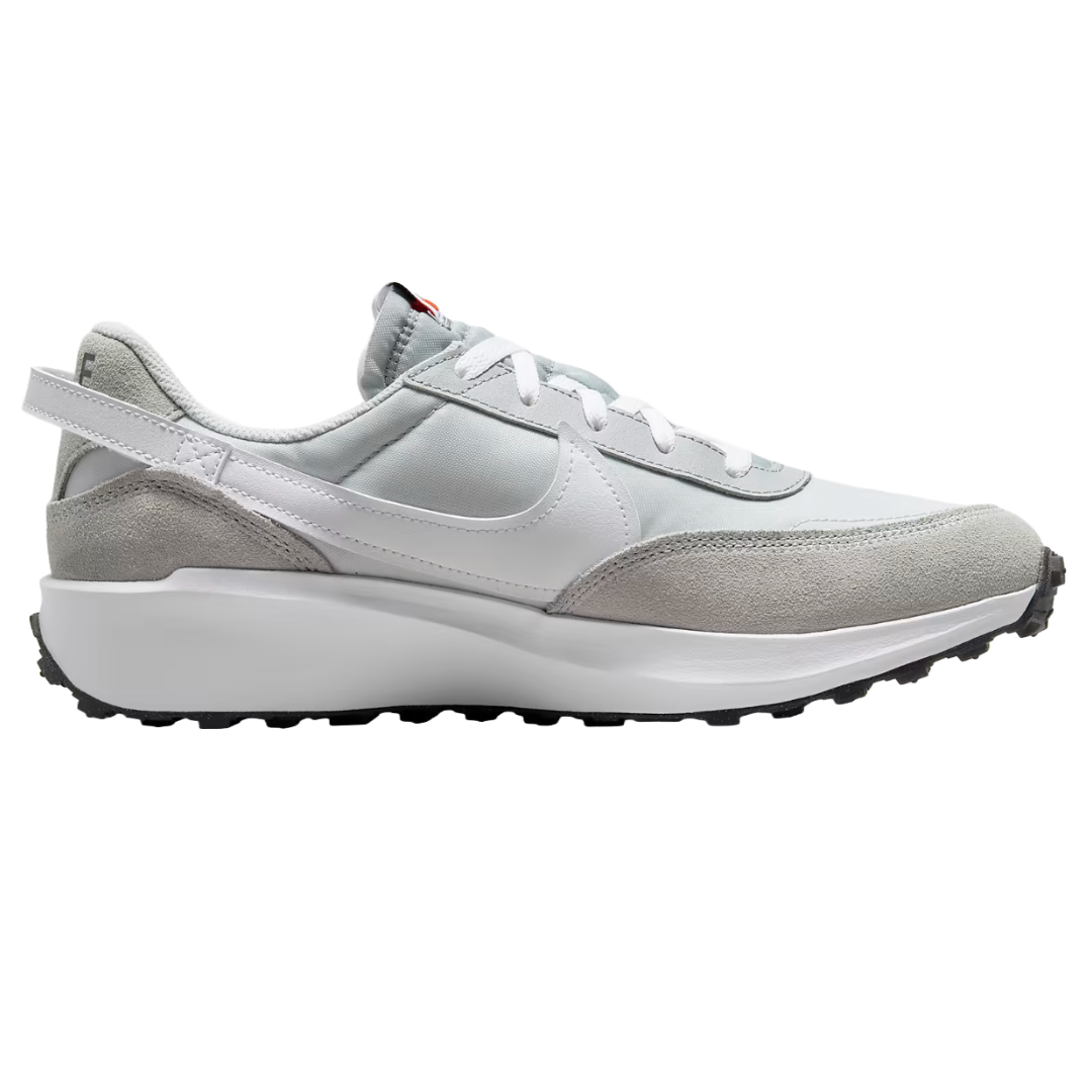 A light grey and white athletic sneaker featuring a retro design with a textured sole, suede overlays, and a swoosh logo on the side.