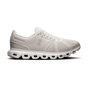 A light gray athletic shoe featuring a breathable mesh upper and a distinctive sole with hollow segments, designed for comfort and performance.