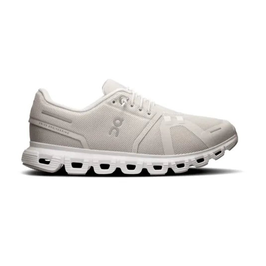 A light gray athletic shoe featuring a breathable mesh upper and a distinctive sole with hollow segments, designed for comfort and performance.
