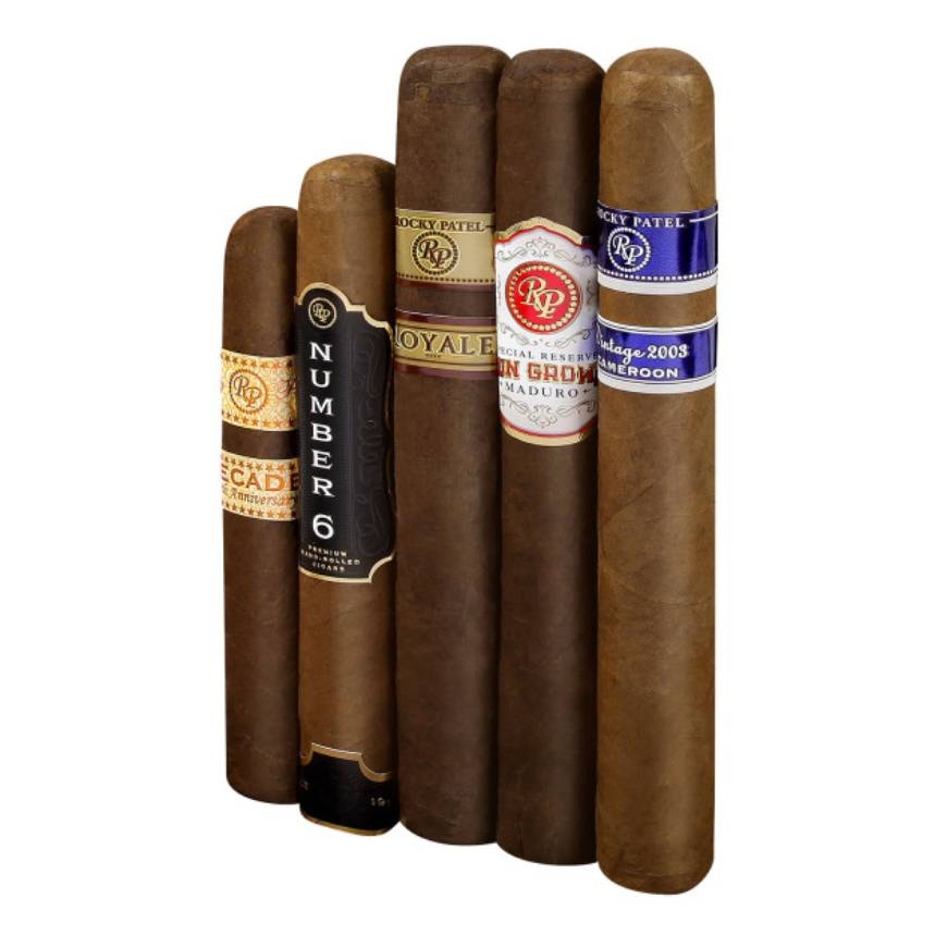 Five cigars with various colored labels and bands, featuring the name Rocky Patel.