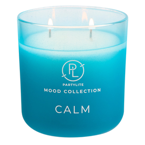A turquoise ombre jar candle from Partylite's Mood Collection labeled \“Calm,\“ featuring a double wick design.