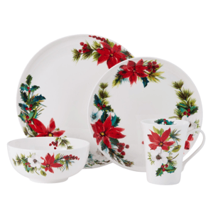 A set of white dinnerware featuring a holiday motif with red poinsettias, green holly leaves, and pine branches, including a dinner plate, salad plate, bowl, and mug.